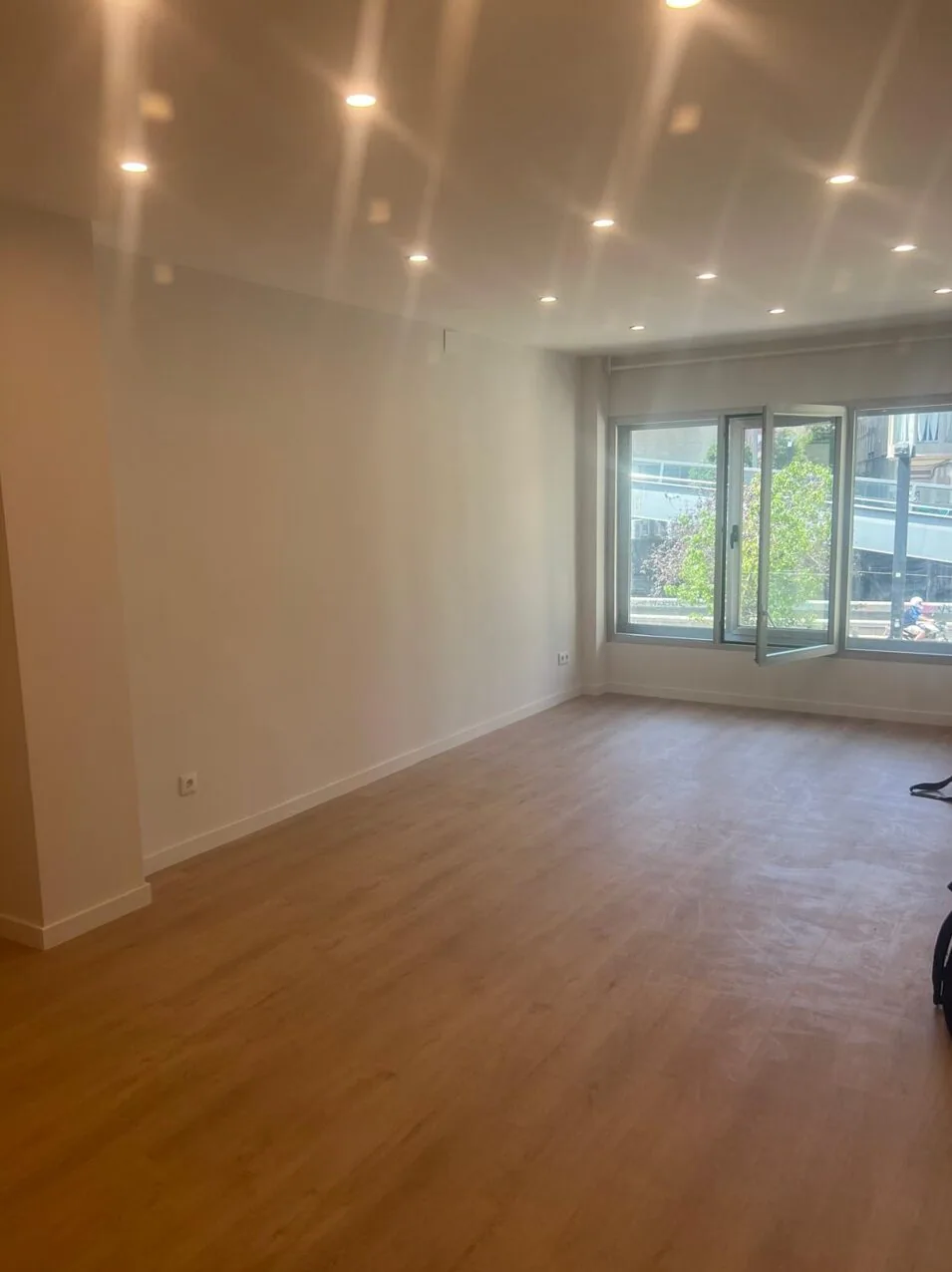 Salón reformado en Proyecto Lesseps, Gràcia (Barcelona)